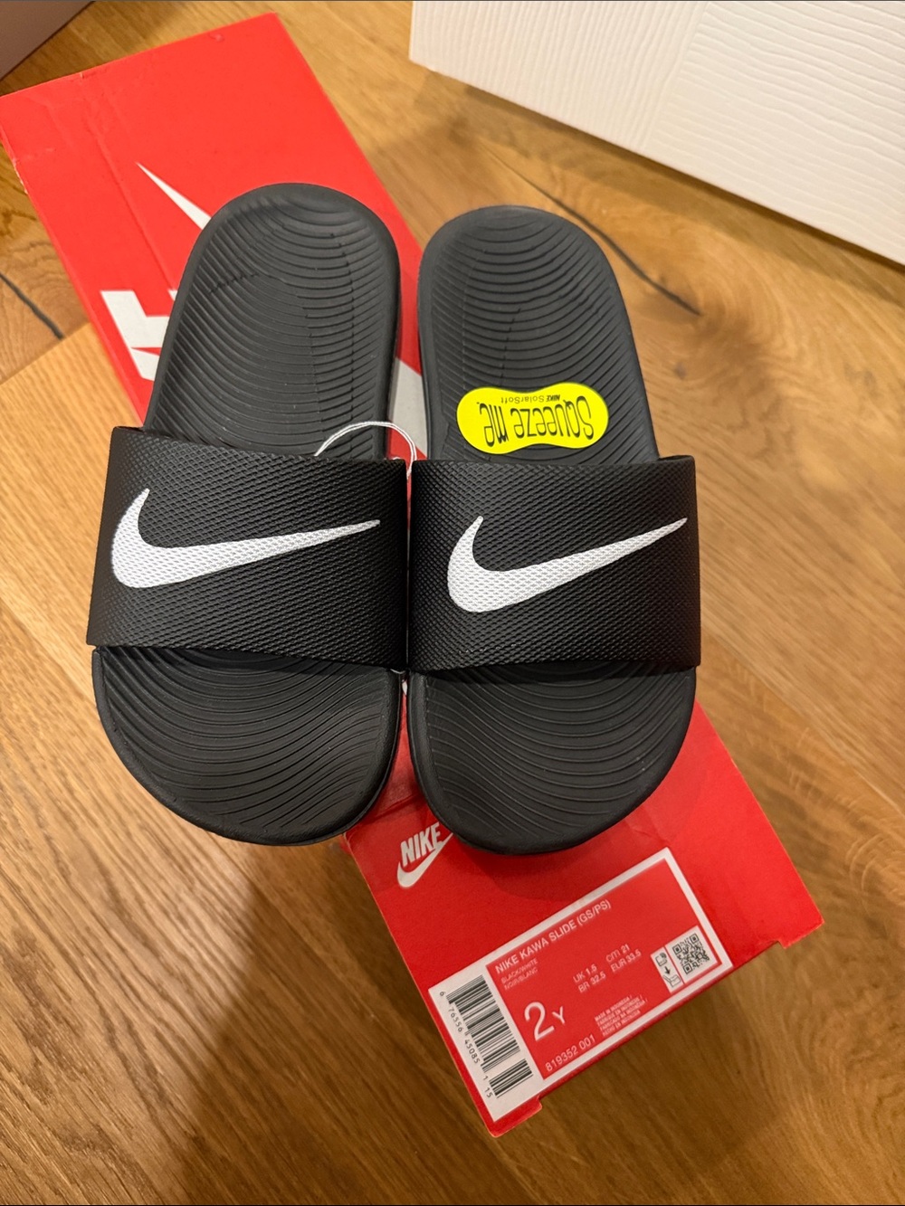 Nike Black Slide Sandals with White Swoosh for Kids
